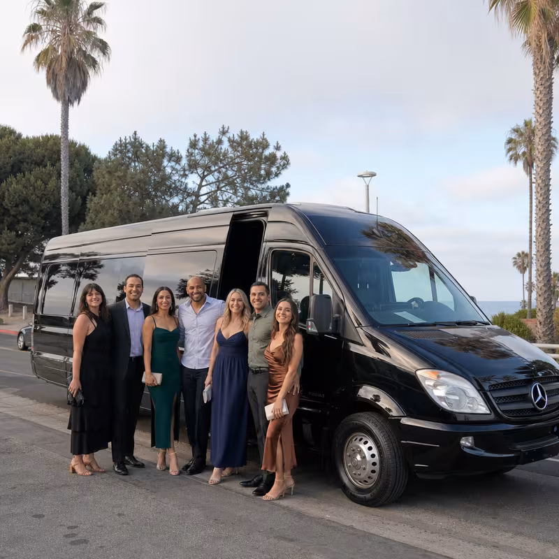 Group beside a Mercedes Sprinter limo from the Encinitas fleet