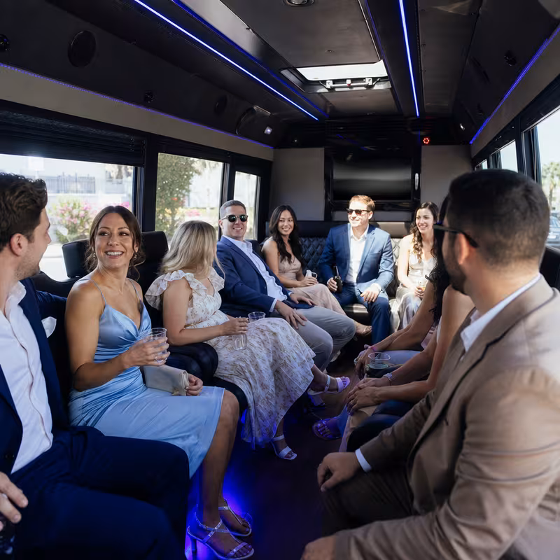 Wedding guests seated inside a Encinitas party bus