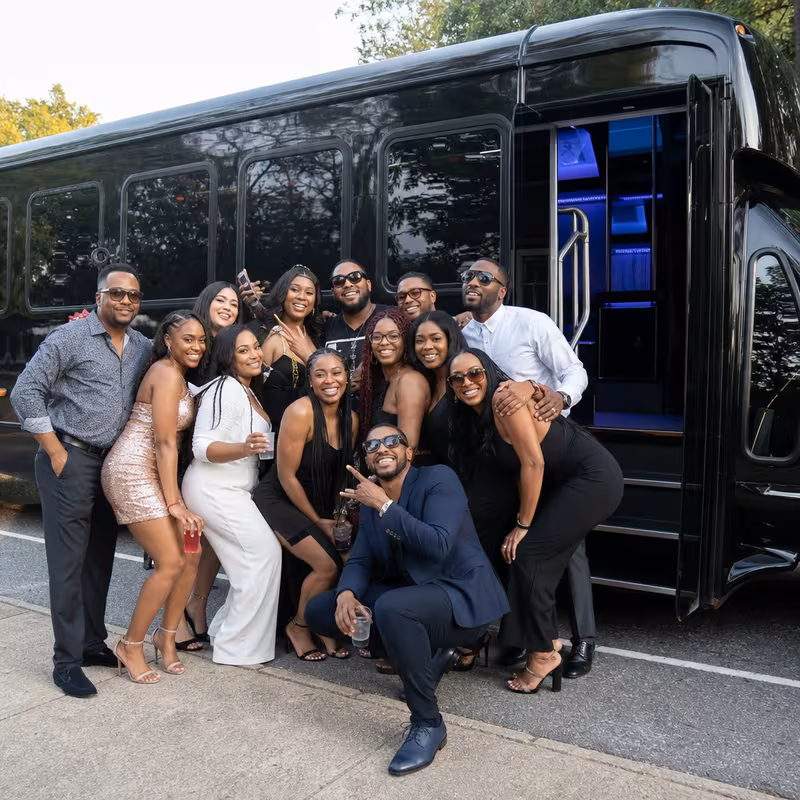 Party bus interior with wraparound leather seating and LED lighting in Encinitas