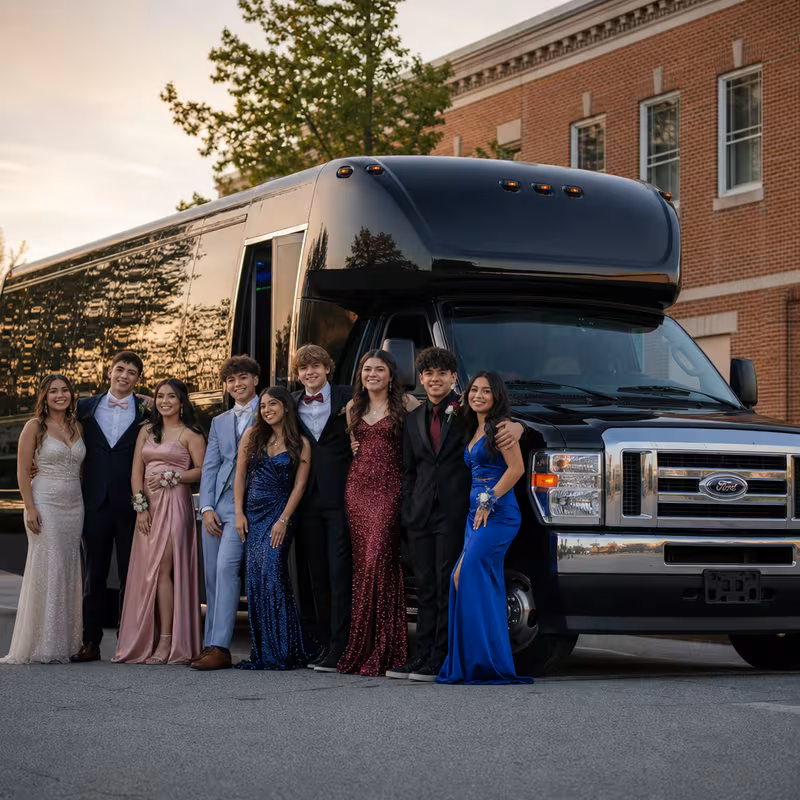 Group boarding a white charter bus for Prom & Homecoming Transportation transportation in Encinitas