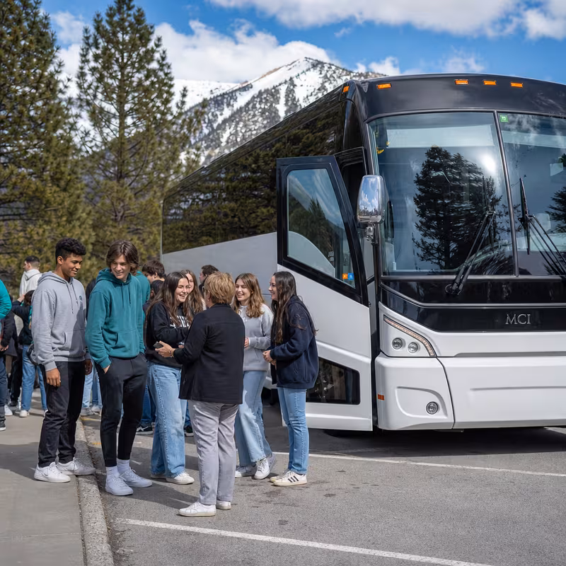 Black Mercedes Sprinter van staged for an Encinitas School Transportation group