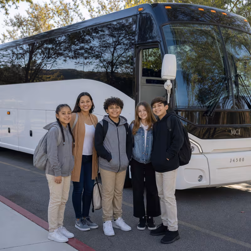 Passengers loading luggage while boarding an Encinitas group shuttle