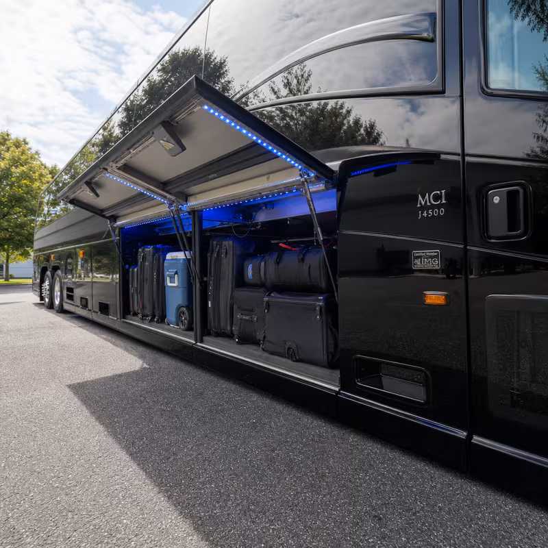Party bus interior with wraparound leather seating and LED lighting in Encinitas